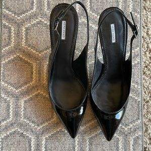 Black patent leather slingback heels